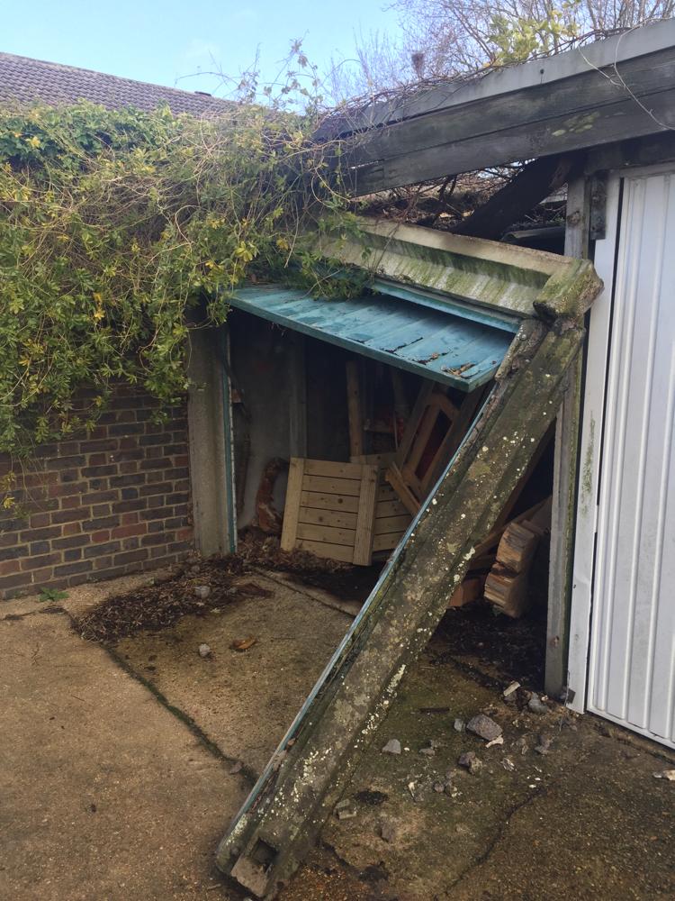 Garage door broken up and over garage door Garage door broken up and over garage door