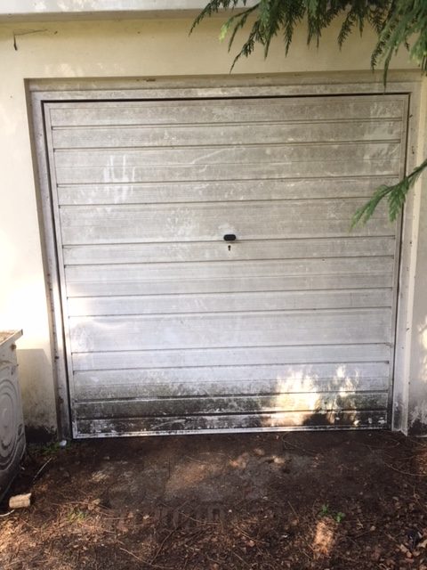 Garage door broken up and over garage door
