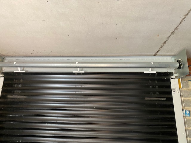 Garage door broken up and over garage door