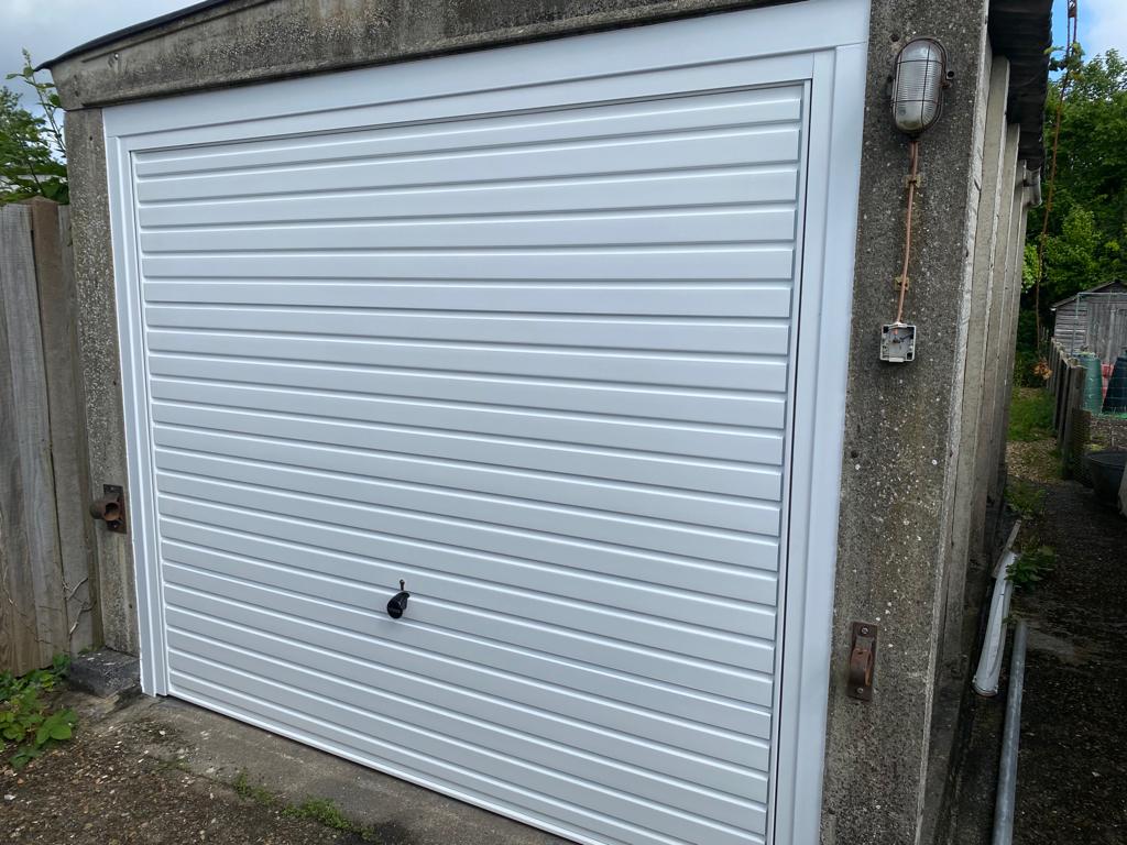 Garage door broken up and over garage door