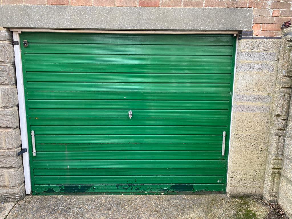 Garage door broken up and over garage door