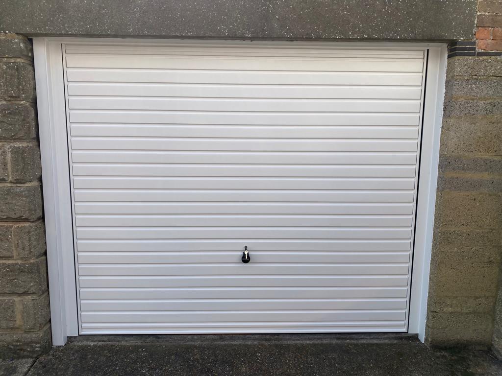 Garage door broken up and over garage door